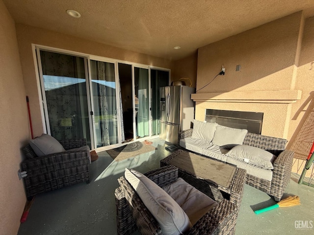 balcony with an outdoor hangout area