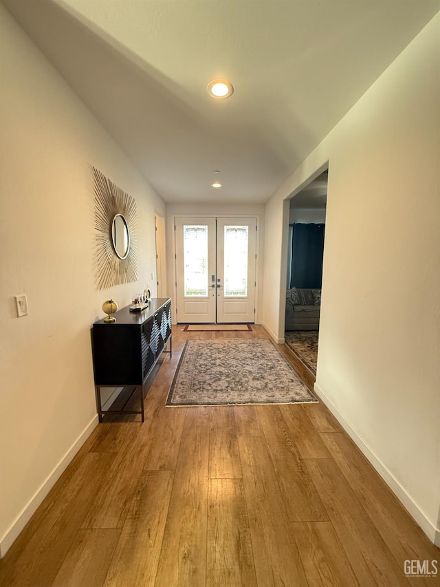 doorway featuring french doors and wood-type flooring