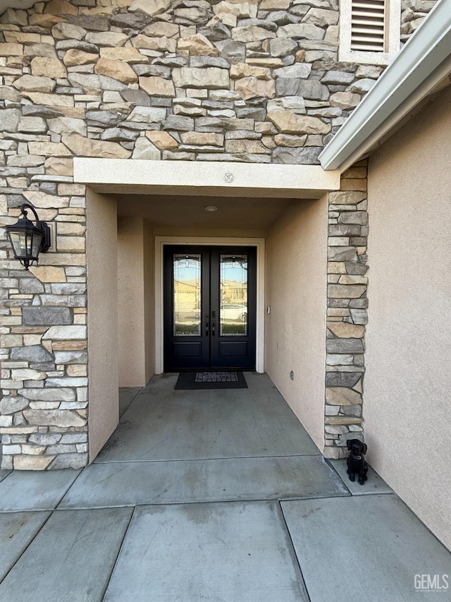 doorway to property with french doors