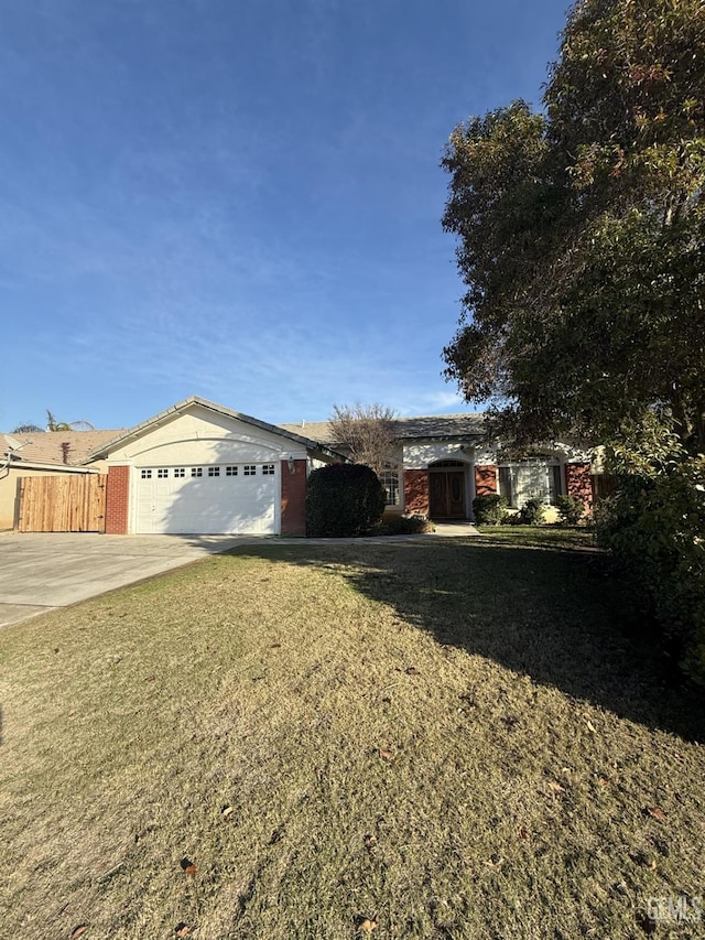 ranch-style house with a front lawn and a garage