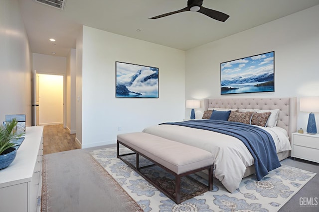 bedroom featuring wood finished floors, ceiling fan, recessed lighting, and baseboards
