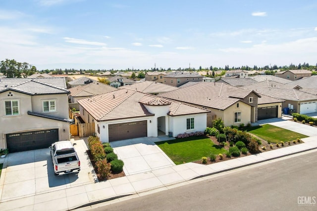 view of front of property featuring stucco siding, driveway, and a residential view