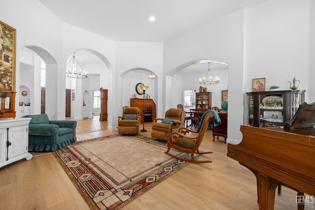 3121 Emerald Arbor St, Bakersfield, CA 93314 - interior space featuring a chandelier, light wood finished floors, and a high ceiling