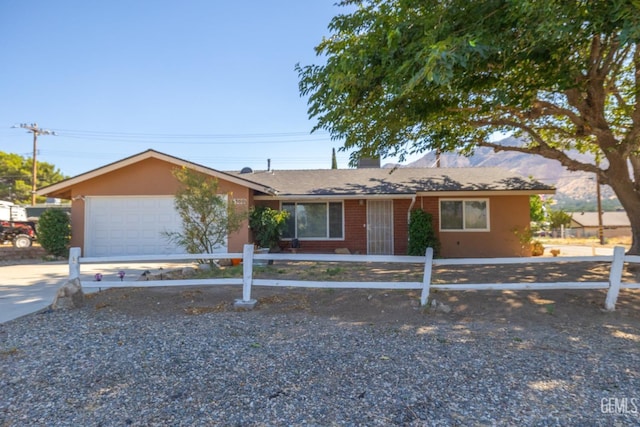 6300 Lynch Canyon Dr, Lake Isabella, CA 93240 - ranch-style house with a garage