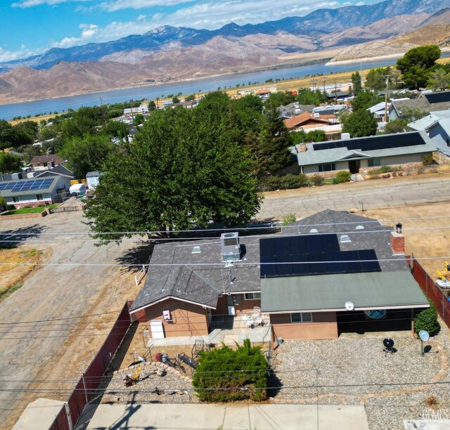 bird's eye view featuring a water and mountain view