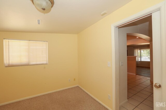 view of tiled spare room