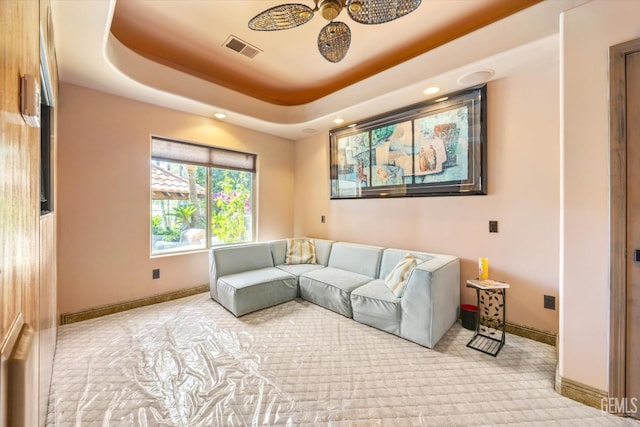 4905 Islands Dr, Bakersfield, CA 93312 - carpeted living area with baseboards, recessed lighting, and a raised ceiling