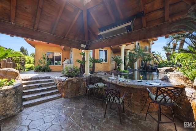 4905 Islands Dr, Bakersfield, CA 93312 - view of patio featuring an outdoor bar and a gazebo
