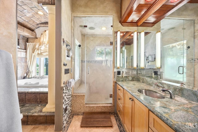 4905 Islands Dr, Bakersfield, CA 93312 - full bathroom featuring vanity, a shower stall, a bath, and tile patterned floors