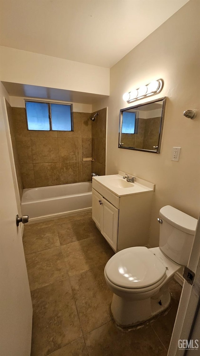 bathroom with toilet, shower / bath combination, and vanity