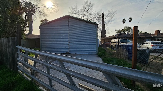 view of side of home with fence