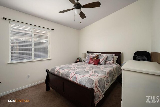 carpeted bedroom with lofted ceiling, baseboards, and ceiling fan