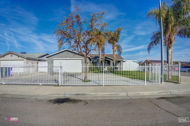 view of front of house with a garage and a front lawn