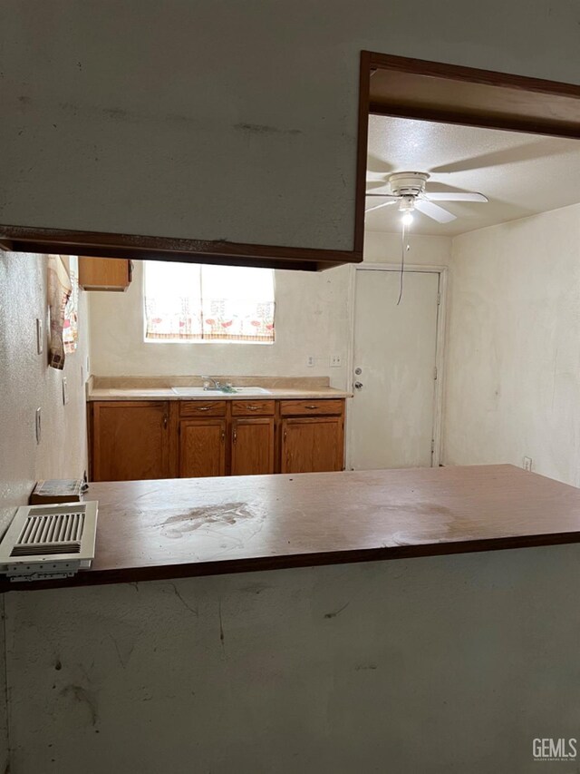 bathroom featuring a shower with curtain and toilet