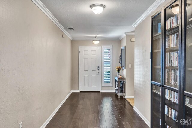 12503 Maclure Dr, Bakersfield, CA 93311 - foyer with wood finished floors, ornamental molding, and a textured ceiling