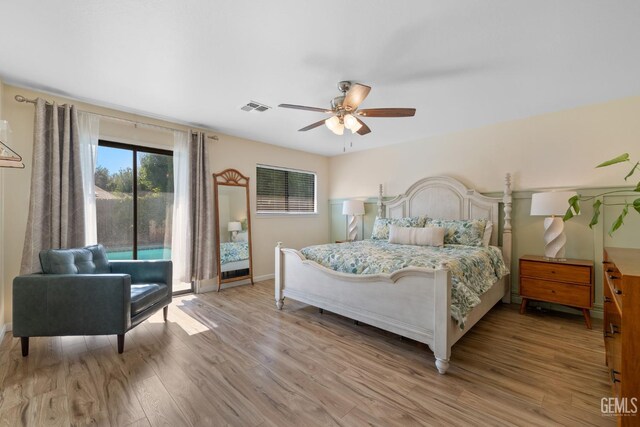 2700 Hoad Ln, Bakersfield, CA 93309 - bedroom featuring access to outside, light wood finished floors, baseboards, and ceiling fan