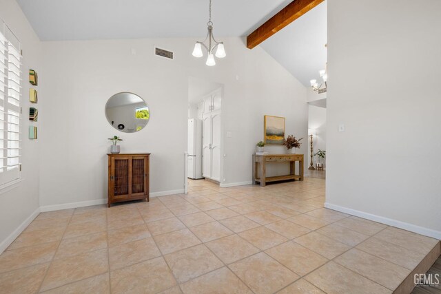 2700 Hoad Ln, Bakersfield, CA 93309 - foyer featuring a chandelier, beam ceiling, light tile patterned flooring, high vaulted ceiling, and baseboards