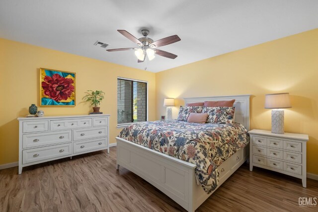 2700 Hoad Ln, Bakersfield, CA 93309 - bedroom featuring wood finished floors, baseboards, and a ceiling fan