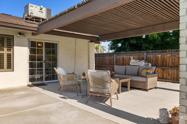 2700 Hoad Ln, Bakersfield, CA 93309 - view of patio with an outdoor hangout area and cooling unit