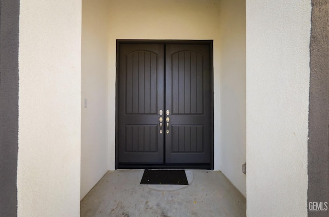 4414 Coal Rock Ct, Bakersfield, CA 93313 - property entrance with stucco siding and french doors