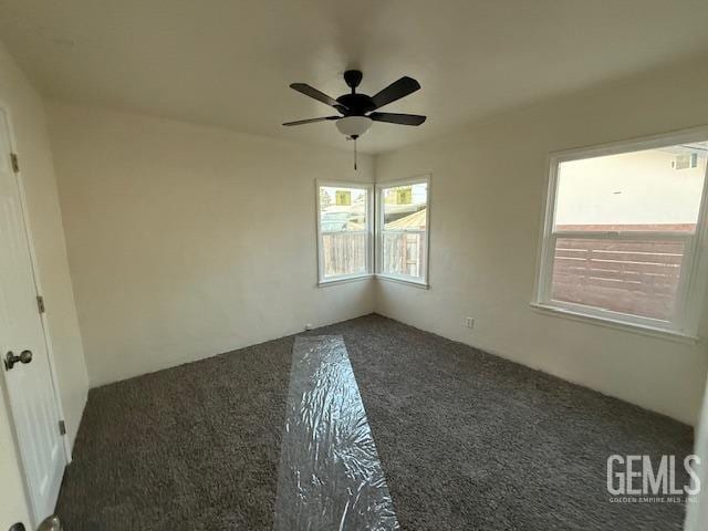 spare room featuring ceiling fan