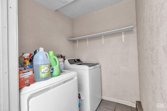 1504 Stockton Ave, Bakersfield, CA 93308 - laundry area featuring washing machine and dryer and tile patterned flooring