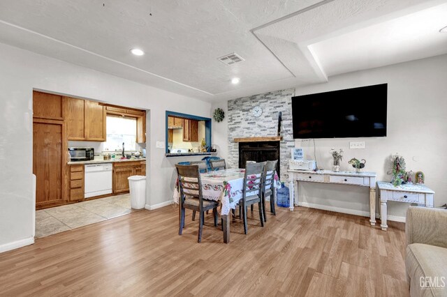 1504 Stockton Ave, Bakersfield, CA 93308 - dining room with light wood-style flooring and recessed lighting