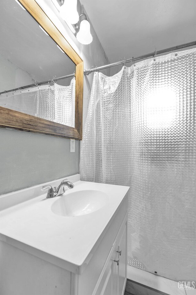 1504 Stockton Ave, Bakersfield, CA 93308 - bathroom featuring vanity and a shower with curtain