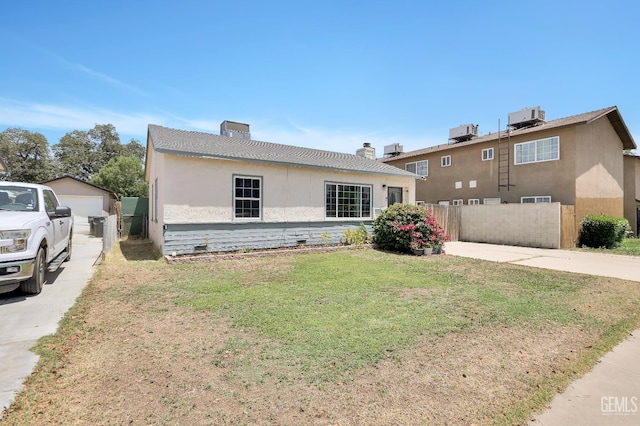 1504 Stockton Ave, Bakersfield, CA 93308 - view of front of property with stucco siding, a chimney, and a garage