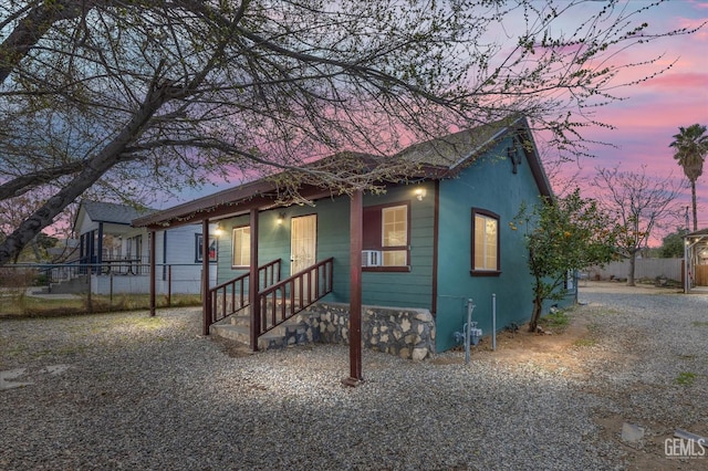 view of front of house with fence