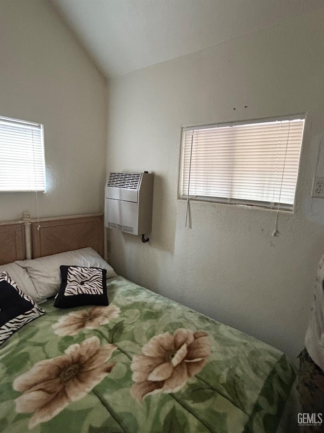 47701 Sugarloap Loop, Posey, CA 93260 - bedroom with multiple windows, vaulted ceiling, and heating unit