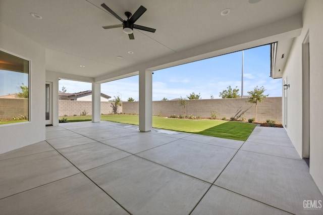 view of patio / terrace featuring ceiling fan