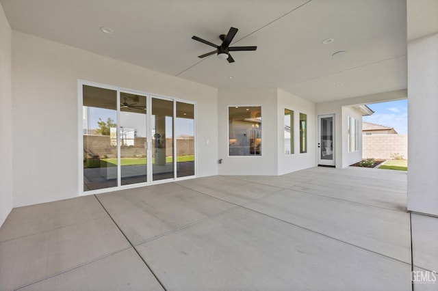 view of patio featuring ceiling fan