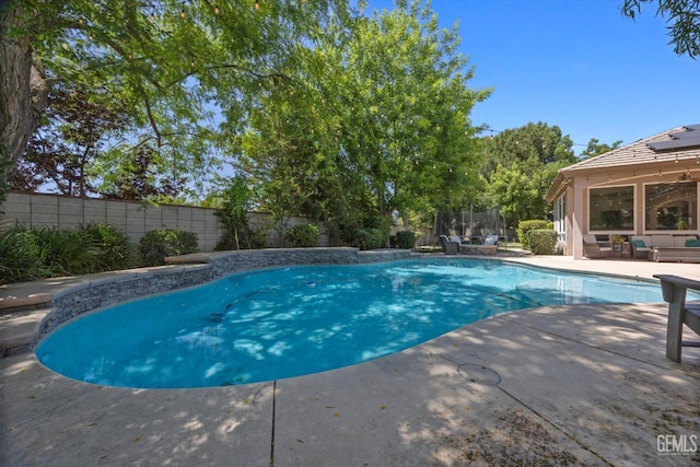 1001 Paxton Way, Bakersfield, CA 93312 - view of swimming pool with a patio area and a fenced backyard