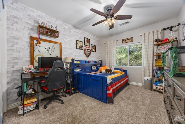 1001 Paxton Way, Bakersfield, CA 93312 - carpeted bedroom featuring a desk, ceiling fan, and brick wall