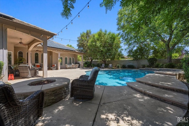 1001 Paxton Way, Bakersfield, CA 93312 - view of swimming pool with a fire pit, a patio, a fenced backyard, and a ceiling fan