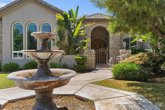 1001 Paxton Way, Bakersfield, CA 93312 - mediterranean / spanish home featuring a gate and stucco siding