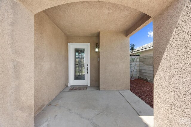 4312 Rio Viejo Dr, Bakersfield, CA 93313 - entrance to property featuring stucco siding, fence, and a patio