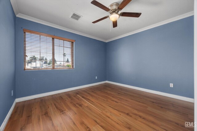 4312 Rio Viejo Dr, Bakersfield, CA 93313 - unfurnished room with wood finished floors, ceiling fan, baseboards, ornamental molding, and visible vents