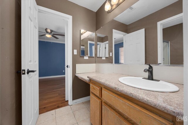 4312 Rio Viejo Dr, Bakersfield, CA 93313 - bathroom featuring tasteful backsplash, vanity, ceiling fan, tile patterned flooring, and visible vents