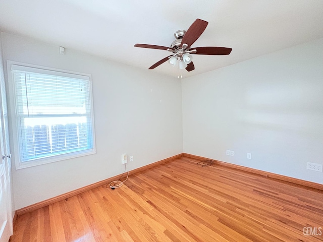 2711 Hubbard St, Bakersfield, CA 93301 - unfurnished room featuring wood finished floors, baseboards, and a ceiling fan