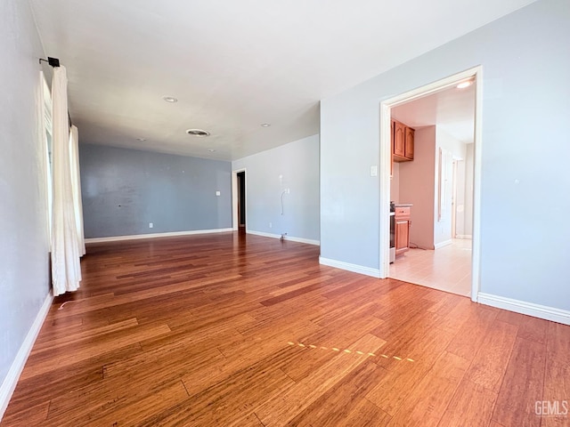 2711 Hubbard St, Bakersfield, CA 93301 - spare room with light wood finished floors and baseboards