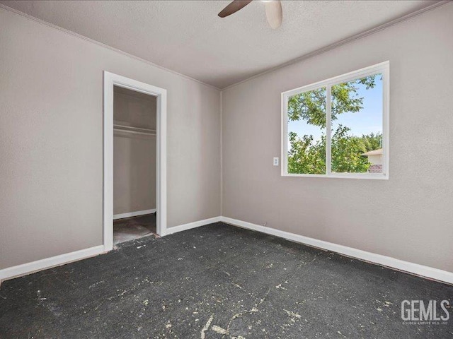 801 Fillmore St, Taft, CA 93268 - unfurnished bedroom with a ceiling fan and crown molding