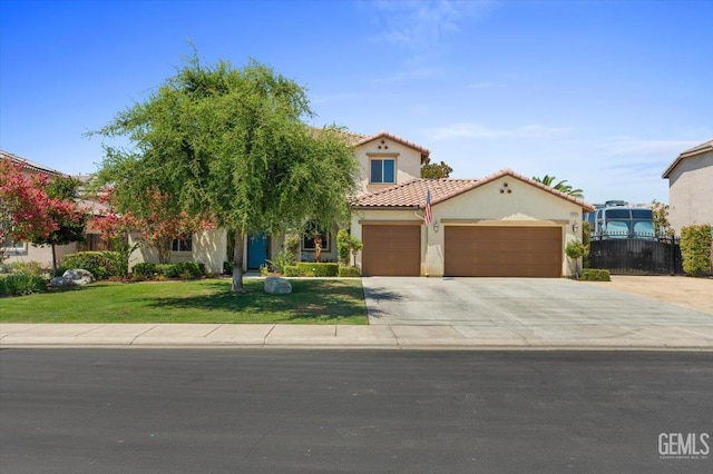 16018 La Strada Ct, Bakersfield, CA 93314 - view of front of property featuring an attached garage, stucco siding, concrete driveway, and a tiled roof