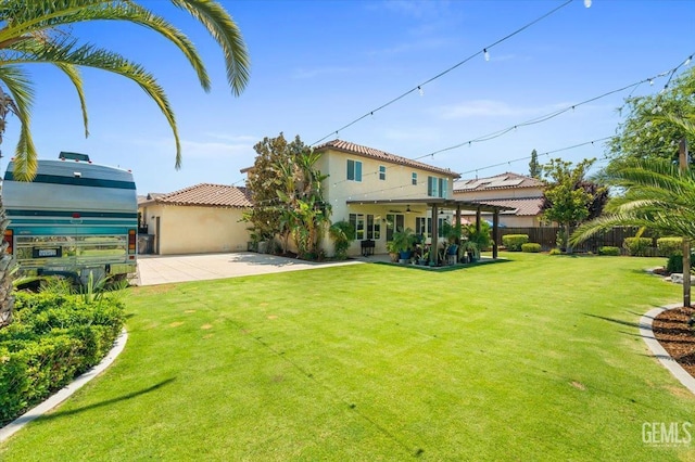 16018 La Strada Ct, Bakersfield, CA 93314 - rear view of property with a patio, stucco siding, and a tile roof