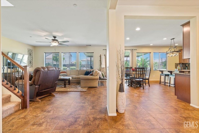 16018 La Strada Ct, Bakersfield, CA 93314 - living area featuring plenty of natural light, a ceiling fan, tile patterned flooring, and recessed lighting