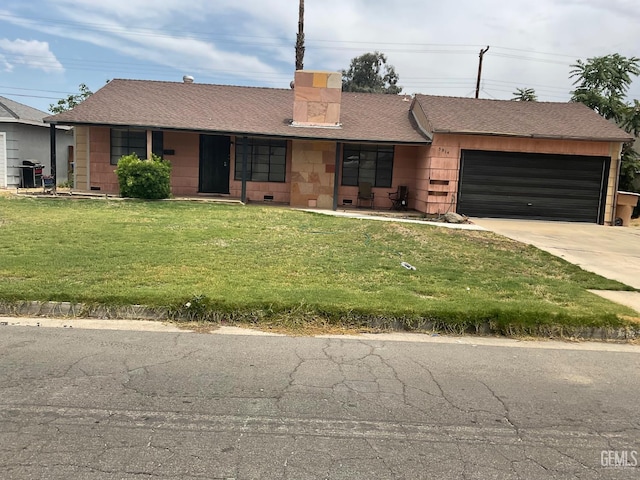 3914 Apache Ave, Bakersfield, CA 93309 - ranch-style house with an attached garage, concrete driveway, a front lawn, and a chimney