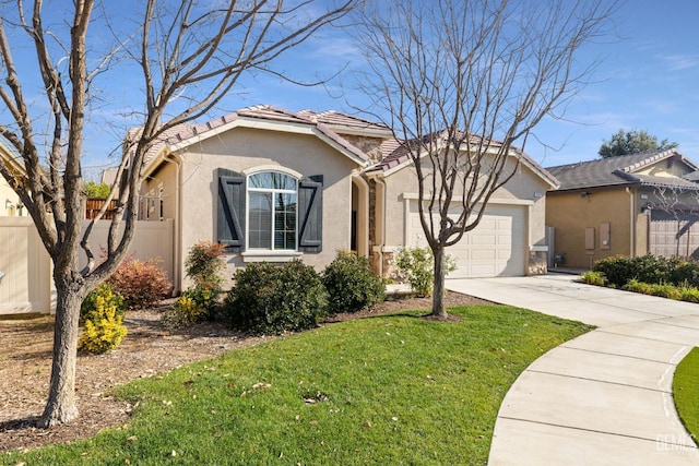 view of front of property with a garage and a front yard