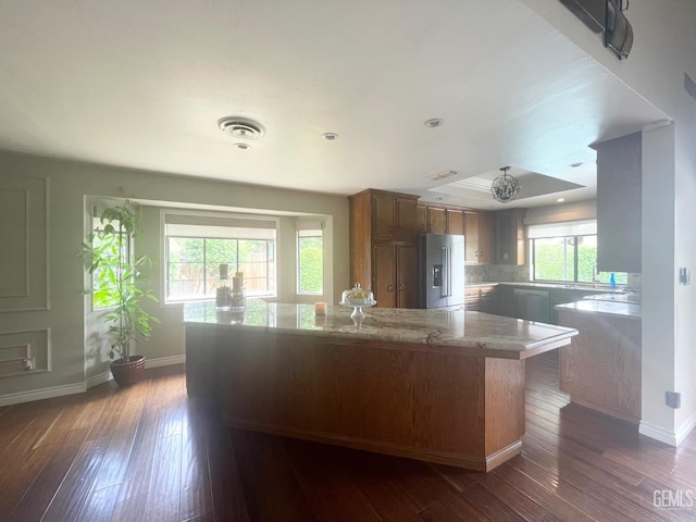 2204 Tilden Way, Bakersfield, CA 93309 - kitchen featuring high quality fridge, dark wood-style floors, a kitchen island, baseboards, and recessed lighting