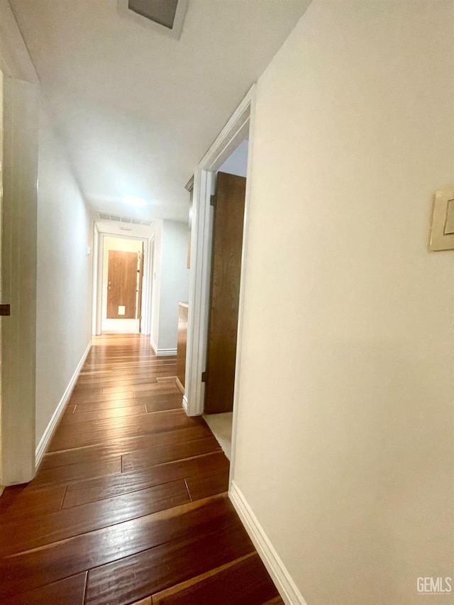 2204 Tilden Way, Bakersfield, CA 93309 - hallway featuring hardwood / wood-style floors and baseboards